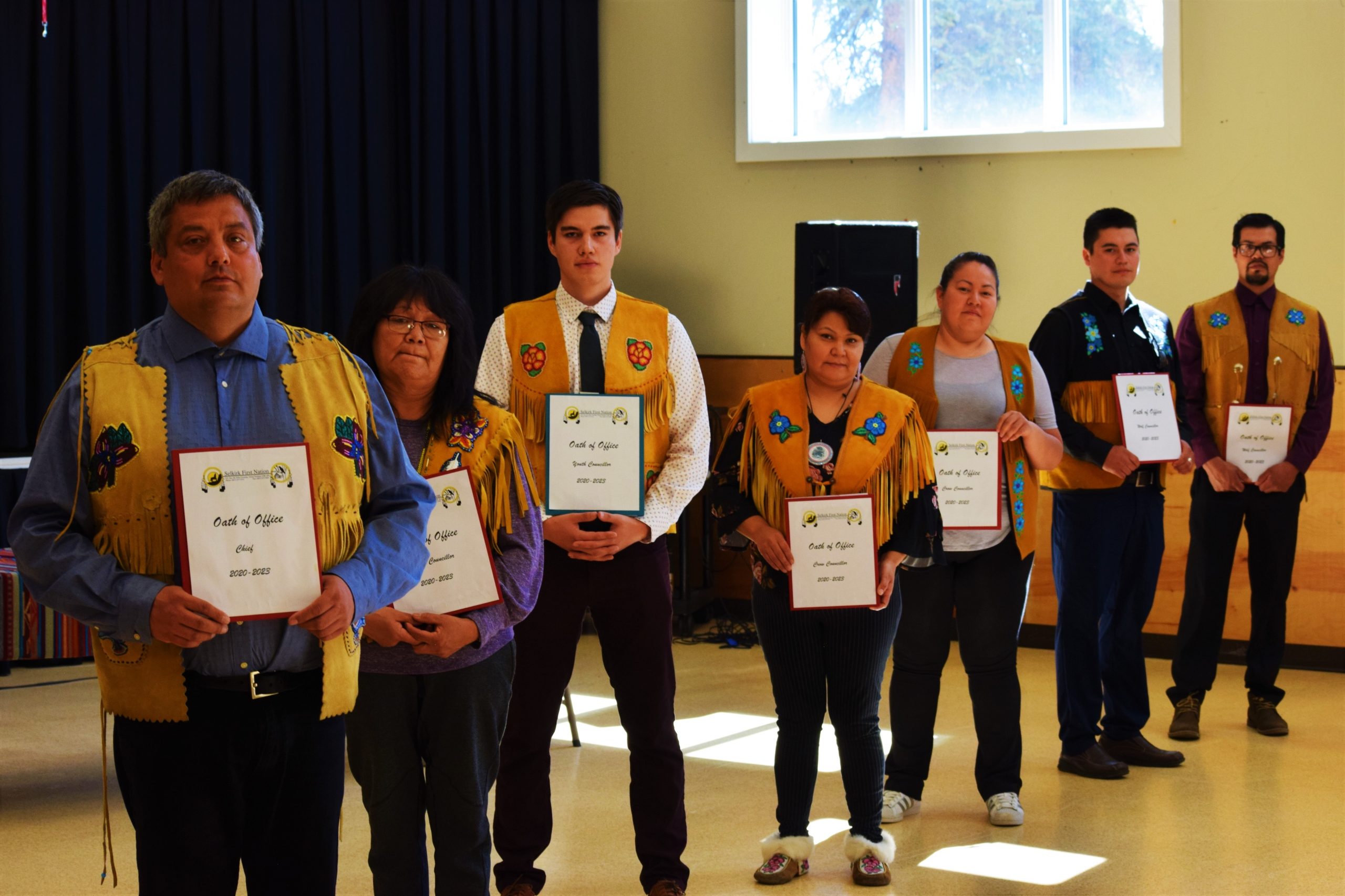 Left to Right: Chief Darin Isaac, Elder Councillor Amy Johnnie, Youth Councillor Cody Sims, Crow Councillor Carmen Baker, Crow Councillor Ashley Edzerza, Wolf Councillor Morris Morrison and Wolf Councillor Jeremy Harper 